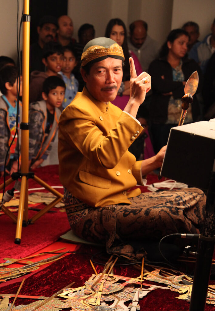 Discover the art and magic of Indonesian puppetry through cultural performances by Pak Sumardi, a master dalang